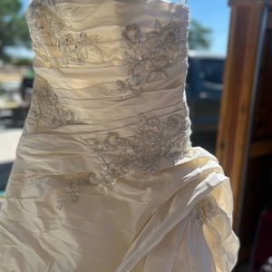 Enzoani women’s ivory wedding gown size 14 with spaghetti straps wrap bodice